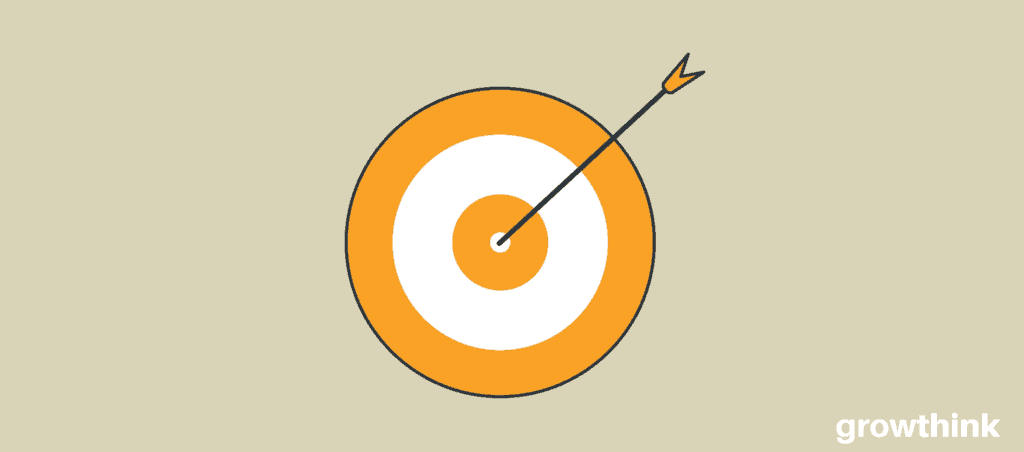 Orange and white target with an orange arrow on the bulls eye