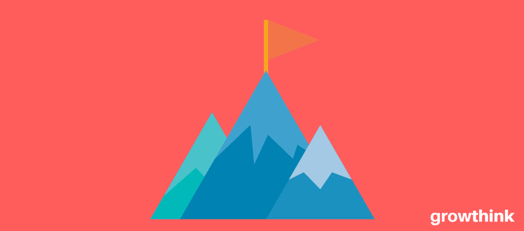 mountain with flag on top