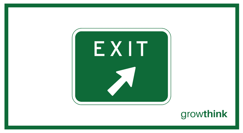 Green EXIT sign with an arrow pointing up
