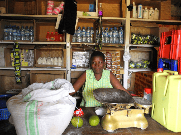 Woman selling goods in a store