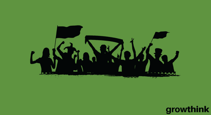Black silhouette of people holding banners and flags