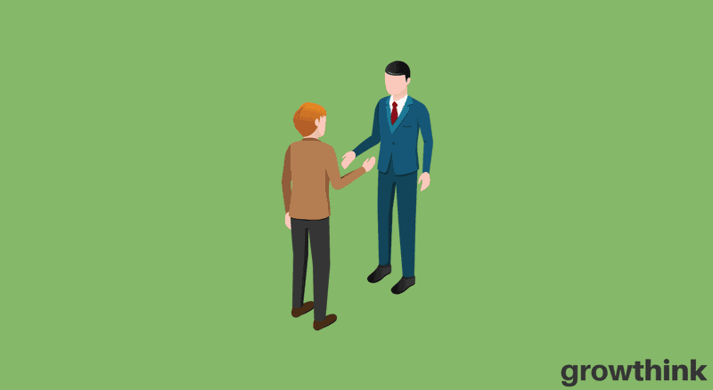 two businessmen shaking their hands