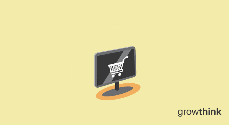 desktop monitor with a white shopping cart on the screen