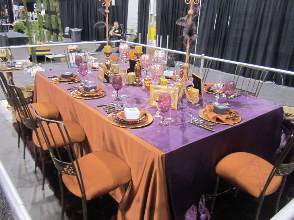 purple and orange halloween themed table arrangement