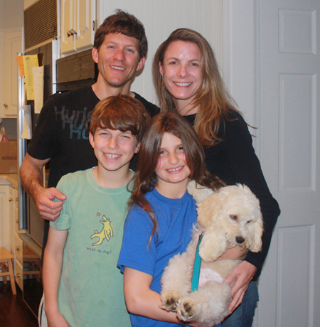 Family picture of Dave Lavinsky with their dog